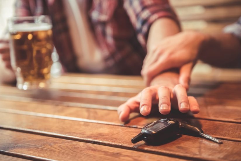 Person Reaching For His Keys