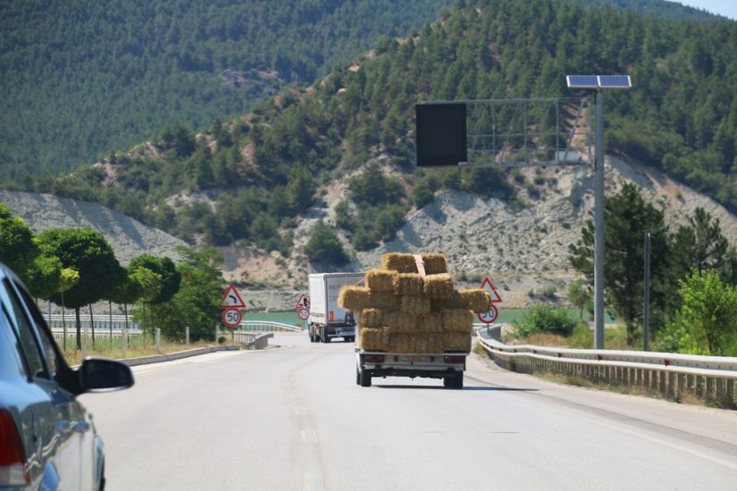 Truck With Too Much Cargo On It