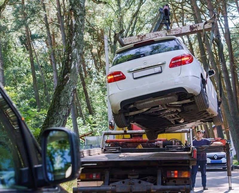 Car Being Loaded On A Truck