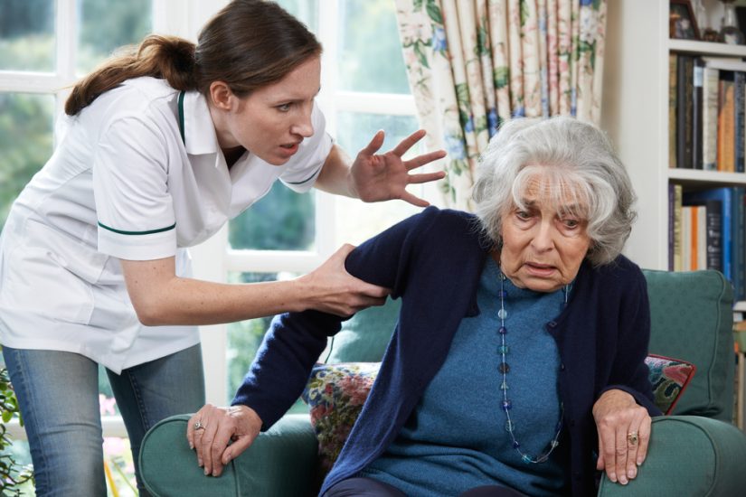 Doctor Holding A Seniors Hand