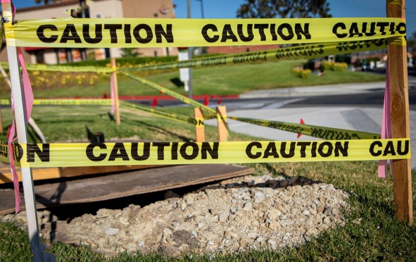 Double Caution Tape Around A Crime Scene