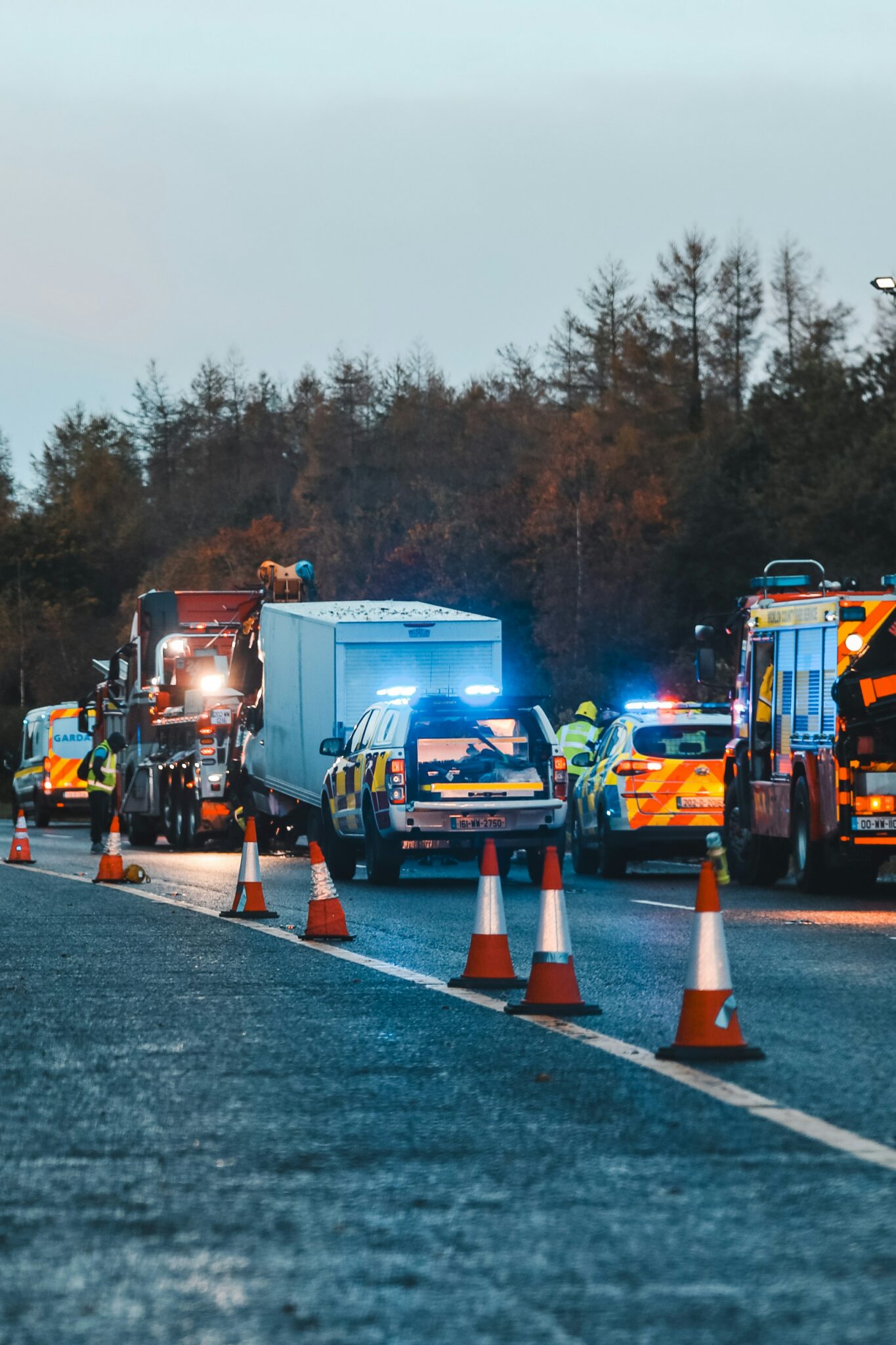 Cops And Ambulence Shining Their Lights Around A Car Accident