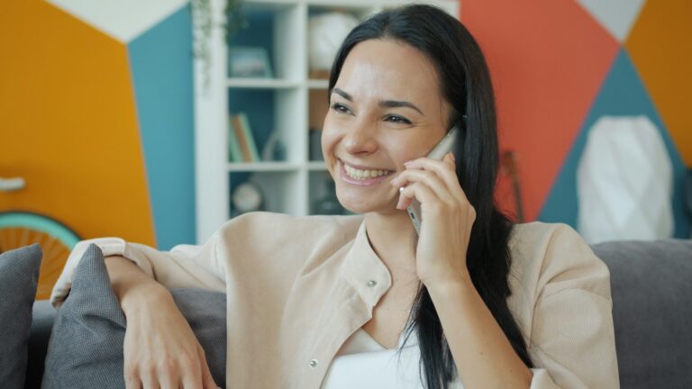 Happy Adult Woman On A Phone